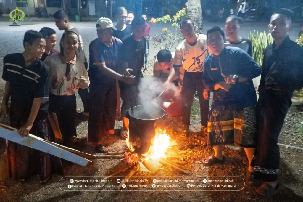 para santri beramai ramai membuat kuah untuk olahan daging kurban di Pondok Darul Hijrah Cindai Alus Martapura Banjar Kalimantan Selatan Indonesia
